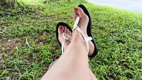 Roxan wears beautiful white flip-flops on her feet matching the pronounced arches (3)