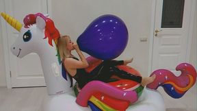 Alla blows up a purple balloon with her mouth while riding an inflatable unicorn and makes a surprise S2P!!!