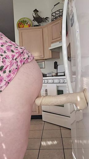 Horny mature MILF rides BWC dildo in kitchen