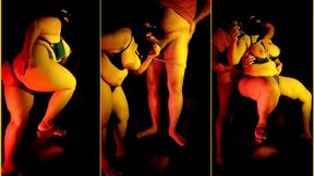 An Indian couple having intense sex in a dark room.