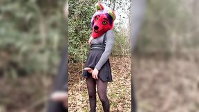 Cute shemale in a fox mask publicly pisses in the forest and vividly cums on camera.