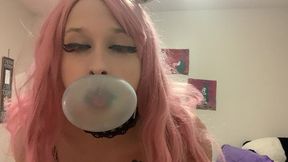 bubble blowing teen shows off body