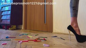 Nastya walks around in high heels, trampling, destroying office supplies, stepping on correction fluid, erasers, pencil sharpeners, markers, and pencils. crush fetish foot fetish high heels legs