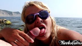 sexy mermaid sucks on the seashore and gets cum in her mouth
