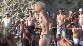 Nice nude dance party right on the beach with a sinful blonde hottie
