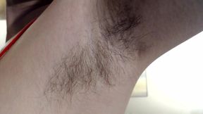 Long dark hairy armpits closeup