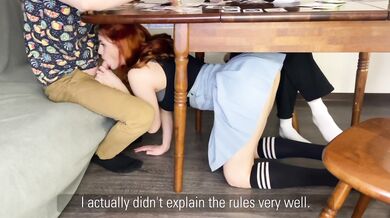 Unexpected blowjob under the table from surprise redhead with big tits gone wild