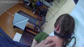 Ballgagged barefoot Amanda in green leotard, hogtied with red hemp rope with her elbows tightly tied, is tickled by the man - POV video (HD WMV)