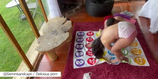 My older stepsister teaches me how to play Twister.