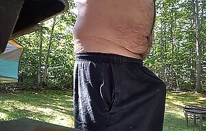 Jerking off outdoors in back yard cum shot public