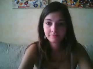 Cute and sexy brunette teen on webcam in her cozy bedroom