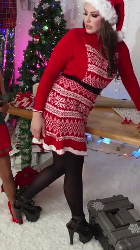 Iconic moment from &quot;Mrs. Claus Surprises The Inventive Elf Sparkle In Her Sex Toy Factory Work Area - Lesbian Christmas&quot;
