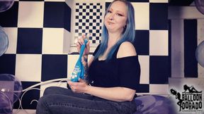 Emily is blowing a soap blue 24 Inch ballon untill it pops HD Version