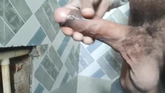 Indian village man with big uncut cock jerks off outdoors