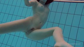 Euro Babe Katy Soroka exhibits off hairy pussy and natural tits in swimming pool