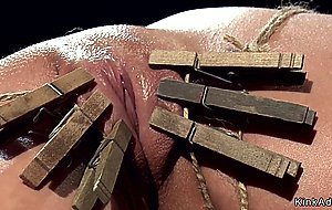 Locked busty lesbian fingered in device