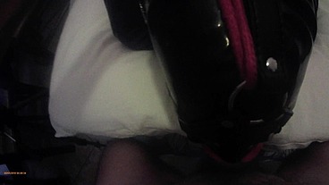 Laura is hogtied in latex catsuite and high heels, throated with a lip open mouth gag POV