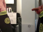 teen boy is urinating in the bathroom