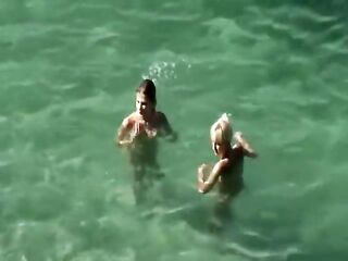 Nudist allies on the beach (Between 'Em)