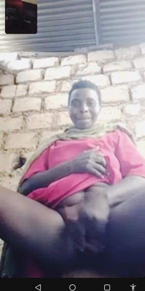 Hadzabe Tribe Mature Woman on Video Call with BF, Don't Ask Me Where She Got the Phone.