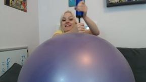 Hilarious blonde nympho with big boobies was playing with inflatable toy