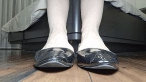 Toe wiggling in patent leather black ballet flats 7