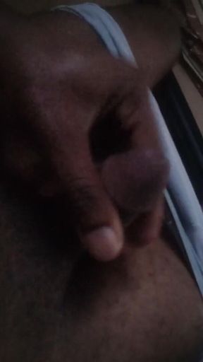 Masturbating