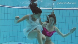 Underwater swimming pool lesbians Lera and Sima Lastova