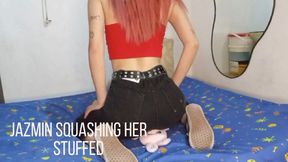 Jazmin squashing her stuffed