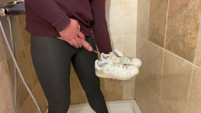 Sissy pees on her sneakers