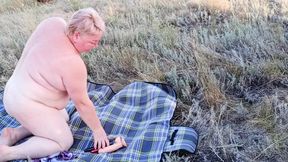 fat cougar masturbates in a public place close up