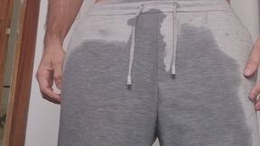 Can’t Hold It Anymore – Hot Wetting in Tight Grey Cotton Shorts