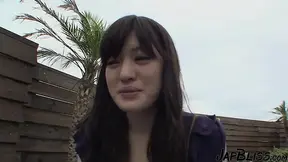 Japanese Girl Engaged in Oral Activity on the Balcony