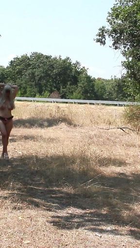 The Littl Tih Girl Shows off Her Tits to the Cars
