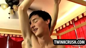 Horny twink tugging on his cock while getting fucked