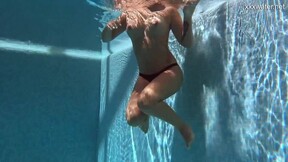 Enjoys her sweet hot body in the pool her name Puzan Bruhova