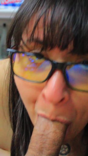 Nerdy Slut Sucks on a Juicy Cock