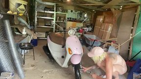 hairy girl - motorbike cleaning