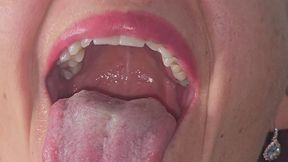 I play with my tongue and show it, making my mouth wet 8K
