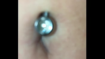 Exploring this sexy belly button with its piercing up close