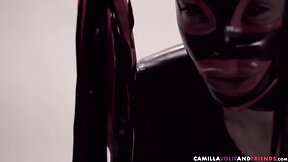 Black she-male in latex