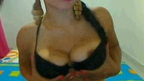 Changing my bras in front of a webcam and teasing with my tits