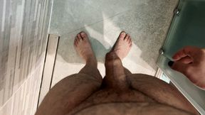 Chubby guy pees in the shower while stroking his dick