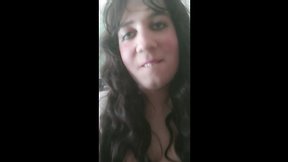 Dark haired CD annarios rubs her large dick and eats cum