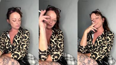 Smoking cougar locks eyes as she teases herself raw