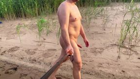 Spcer naked by the river, in public