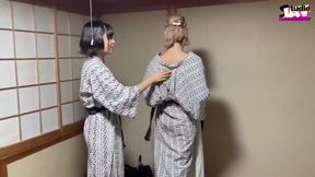 A Blonde and a Dark-haired Beauty Share Wild Passion Beneath the Open Sky. - C