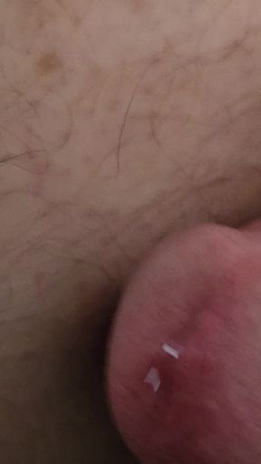 Extremely close up pre cum cock eye