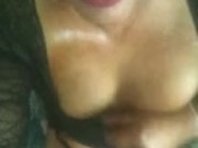 tranny oils up her tits