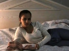 Adorable Indian teen lies on the bed and eventually takes